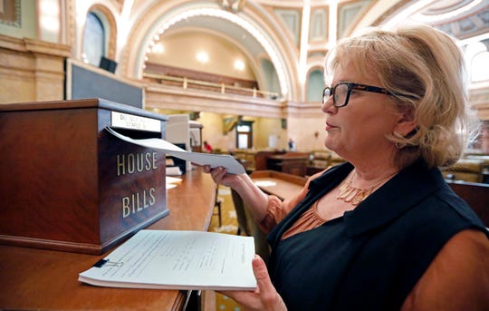 Rep. Becky Currie, R-Brookhaven, files a number of bills in House chambers at the Capitol in Jackson, Miss., Thursday, Jan. 10, 2019. Lawmakers have several days to file proposed legislation before deadline.