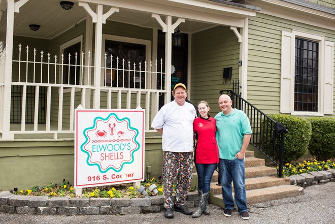 From left, Tim Bednarski, Mandy Edwards and Devin Wood pose for a portrait Feb. 4, 2019, during the grand opening of Elwood's Shells. Elwood's Shells is at 916 S. Cooper St.