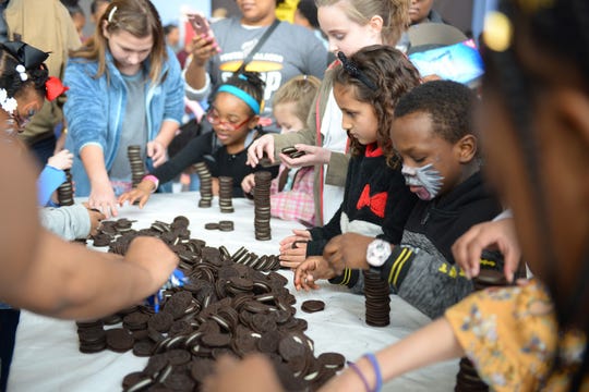 Youth Villages Soup Sunday is a family event, with activities such as Oreo stacking contests for children.