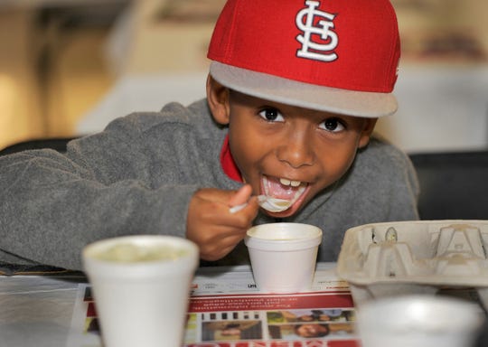 A young attendee enjoys a cup of soup at last year's Youth Villages Soup Sunday. The 30th anniversary of this fundraiser is Feb. 17 at FedEx Forum.