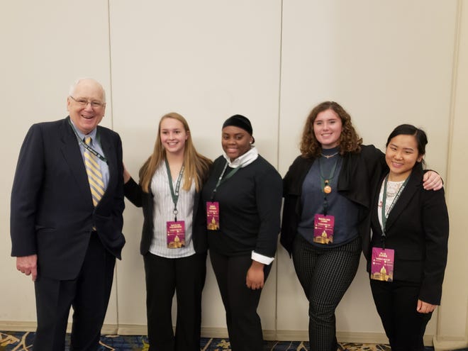 Three Wisconsin students attended the World Food Prize Global Youth Institute last year. Photo shows (left to right): Kenneth Quinn, president of the World Food Prize Foundation; Kaitlyn Holmgren; Samya Hickman; Madeline Lund; and Plia Xiong, UW–Madison CALS Office of Academic Affairs.
