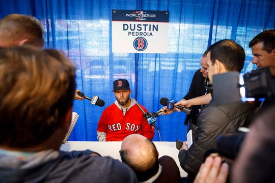 Pedroia speaks to journalists on World Sequence media day in October.