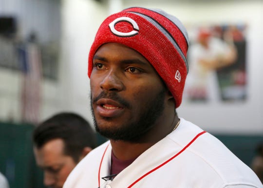 New Reds outfielder Yasiel Puig talks with the media during a visit to the Cincinnati Reds Urban Youth Academy.