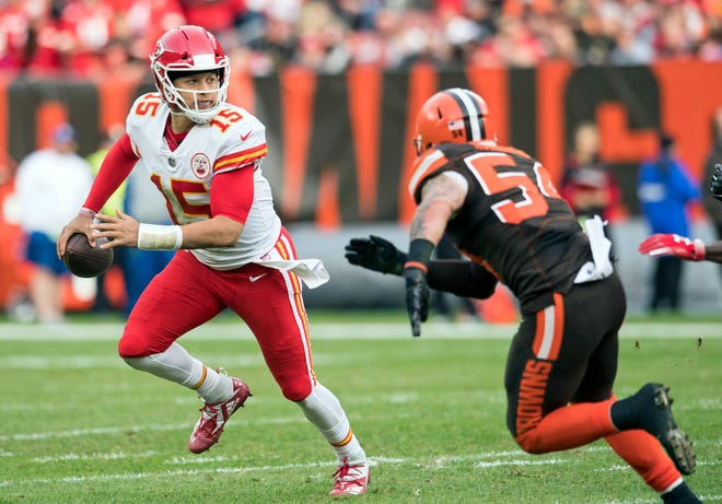 Nov 4, 2018: Kansas City Chiefs quarterback Patrick Mahomes (15) scrambles from Cleveland Browns linebacker Tanner Vallejo (54) during the second half at FirstEnergy Stadium.