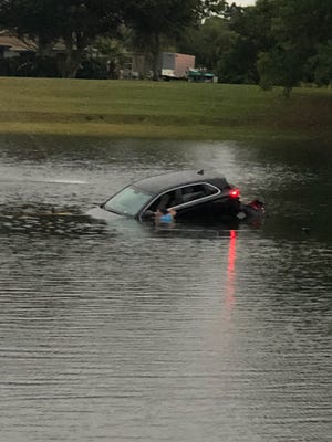 Man accused of driving car into pond while intoxicated in Stuart.