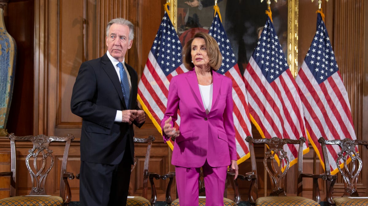 Speaker of the House Nancy Pelosi, D-Calif., center, with Ways and Means Committee Chair Richard Neal, D-Mass., left, waits for a formal photo session with new committee chairs, at the Capitol in Washington, Friday, Jan. 11, 2019.