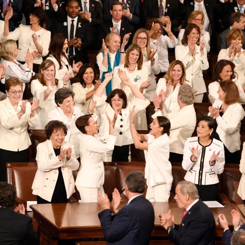 Congresswomen are recognized by President Donald...