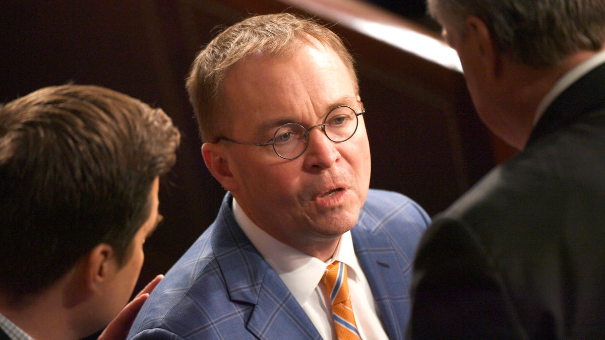 Mick Mulvaney, Director of the Office of Management and Budget, enters the chamber before President Donald Trump delivers the State of the Union address. 