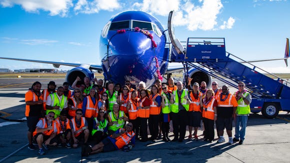 southwest airlines honolulu flight hawaii flights airport employees boeing daniel hawaiian tickets inouye tests international dallas landing welcome lei begin