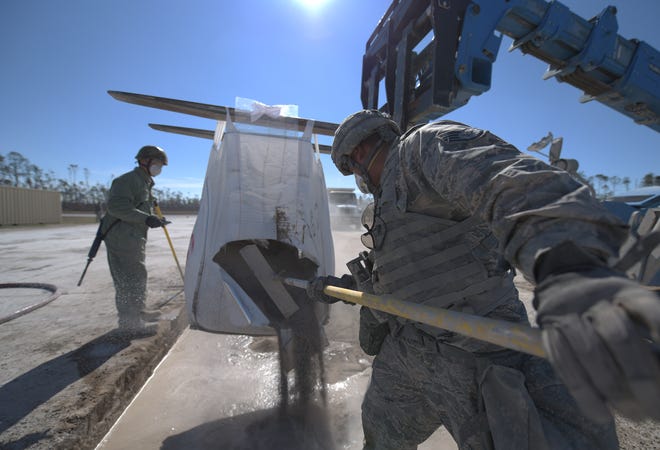 U.S. Air Force 823rd REDHORSE Squadron Detachment 1 students repair a damaged airfield during an exercise at the Silver Flag Site on Tyndall Air Force Base, Fla., Jan. 16. The purpose of the exercise is to ensure Airmen are proficient in using the equipment and materials it takes to rapidly repair a damaged airfield in a deployed setting.