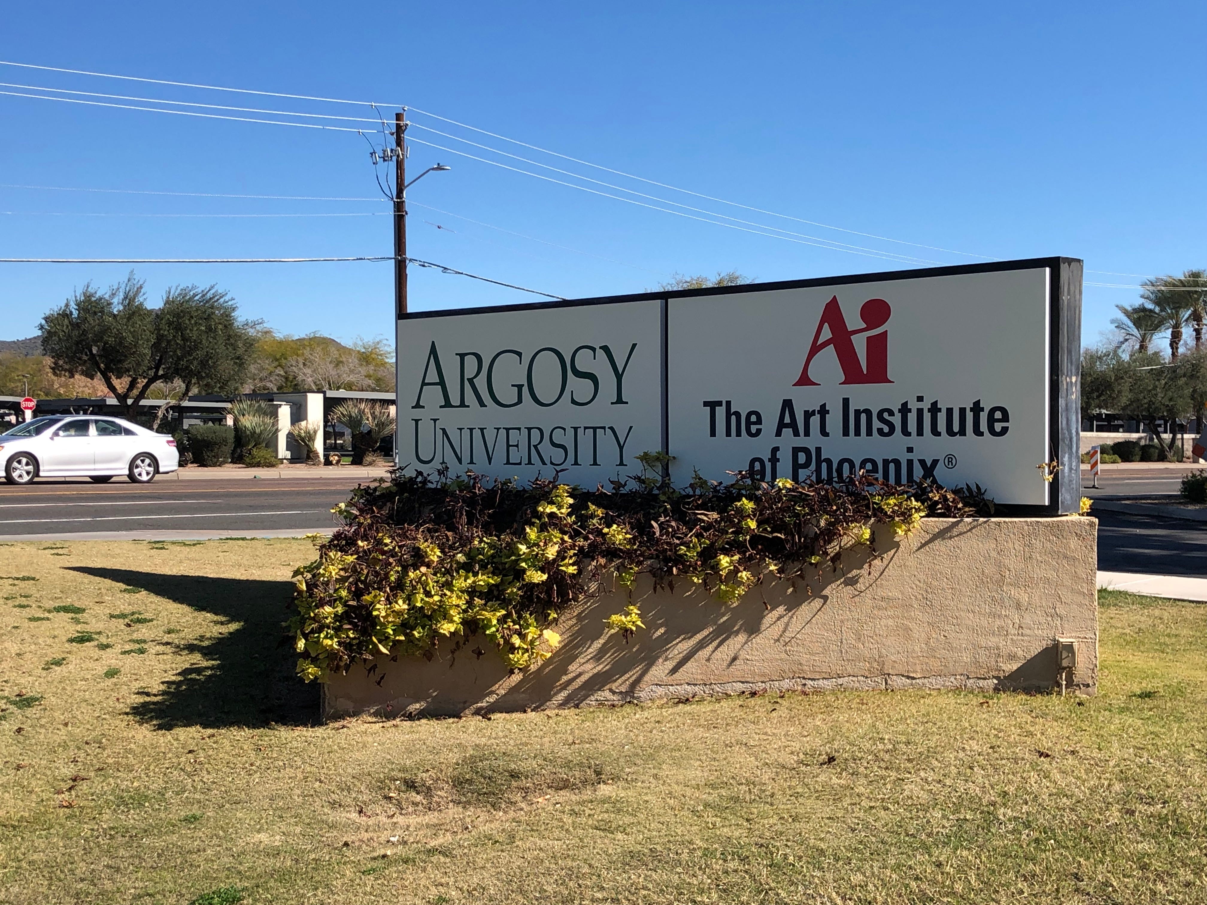 Argosy University in Phoenix is withholding financial aid for students, who can&apos;t pay bills