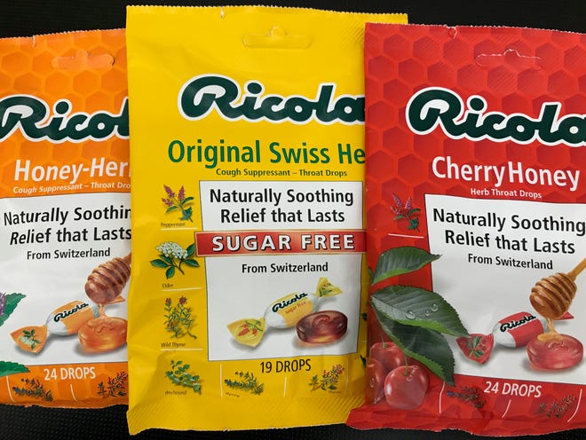 Packes of Ricola throat lozenges that contain the phrase "naturally soothing."
