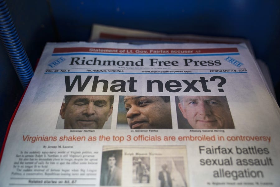 A local newspaper the Richmond Free Press, with a front page featuring top Virginia state officials embroiled in controversies, sits for sale in a newsstand near the Virginia State Capitol, Feb. 9, 2019 in Richmond, Va.  Virginia state politics are in a state of upheaval, with Governor Ralph Northam, State Attorney General Mark Herring, both Democrats, and Republican Senate Majority Leader Tommy Norment involved with past uses associations with blackface and Lt. Governor Justin Fairfax, a   Democrat, accused of sexual misconduct by two women. 