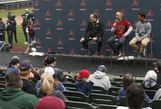 Diamondbacks President Derrick Hall, manager Torey Lovullo and General Manager Mike Hazen answer questions from fans during the Diamondbacks Fan Fest on Saturday.