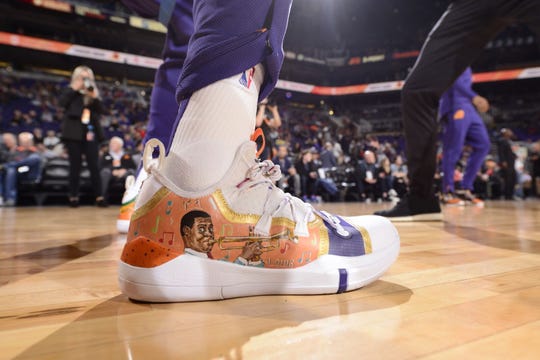 Kelly Oubre Jr. sports "NOLA-themed" Nike sneakers in celebrating Black History Month as the Phoenix Suns forward is from New Orleans.
