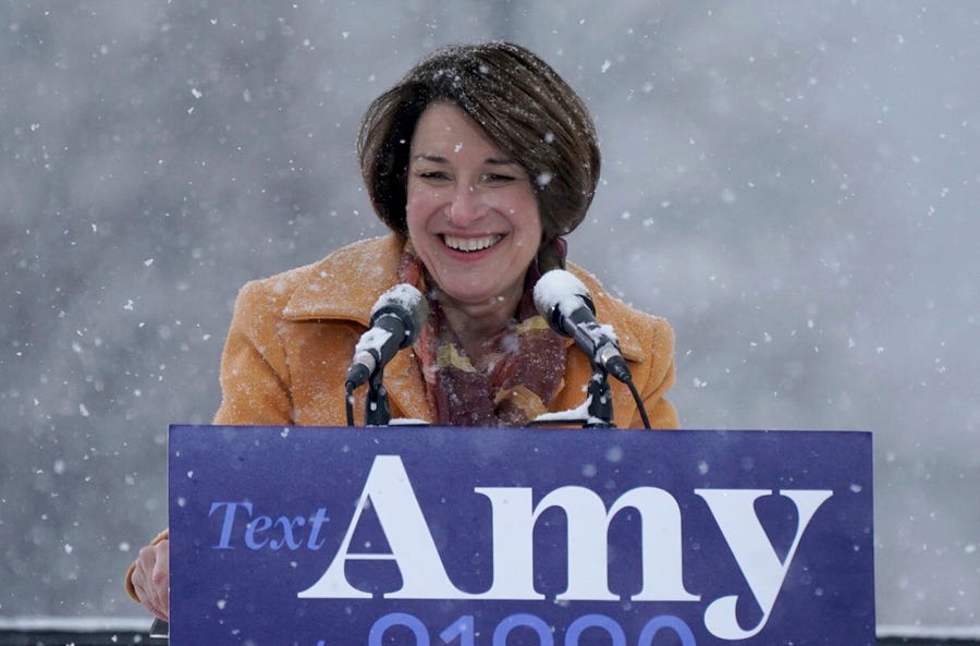 Sen. Amy Klobuchar greets the crowd before announcing her bid for president at Boom Island Park in Minneapolis, Feb. 10, 2019.