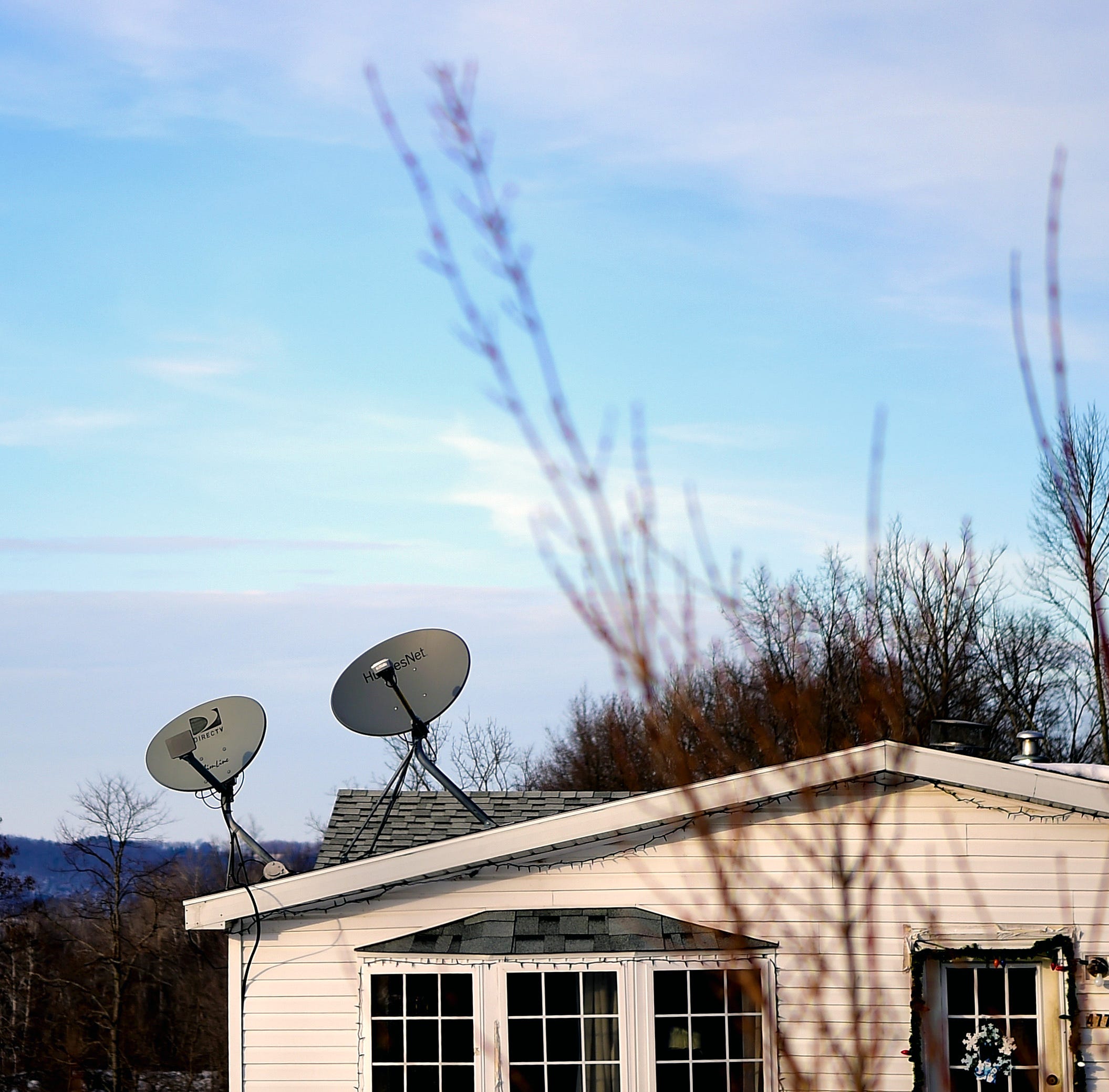 Many residents in rural Steuben County, NY, rely on satellite dishes for television, as digital services are often not available due to unreliable internet. January 28, 2019.