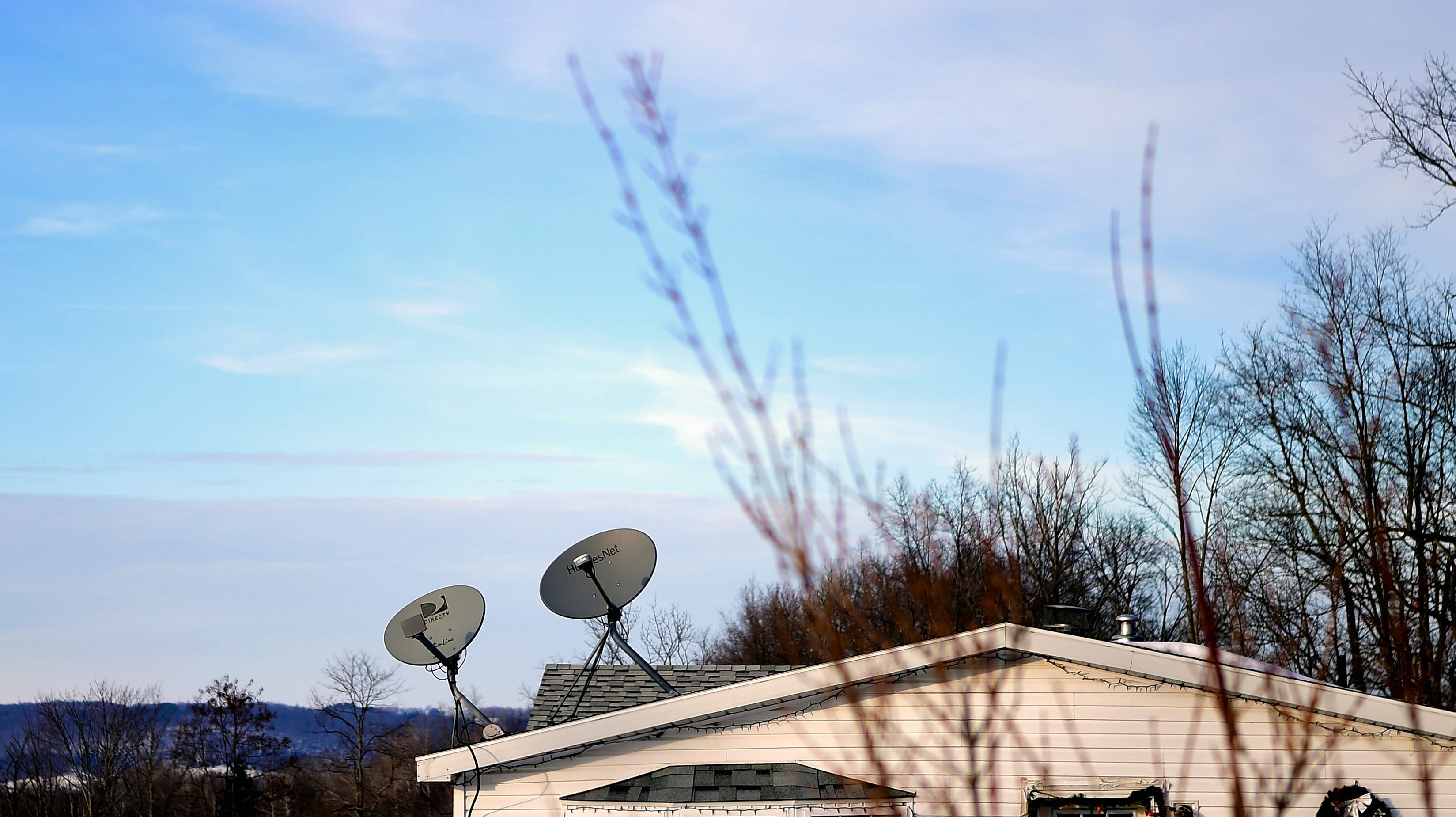 Many residents in rural Steuben County, NY, rely on satellite dishes for television, as digital services are often not available due to unreliable internet. January 28, 2019.