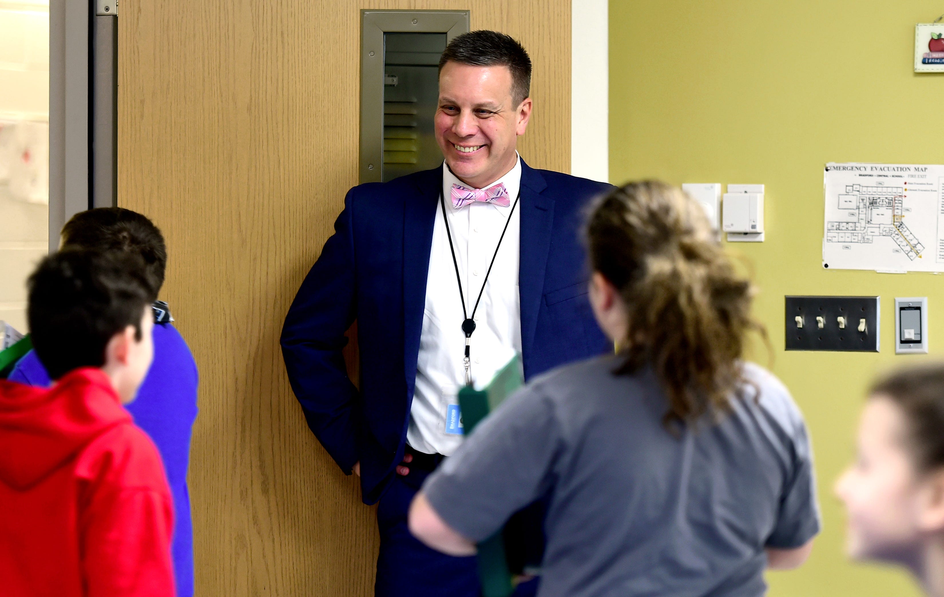 Bradford Central School District superintendent John Marshall greets students between classes. The rural Steuben County district consists of one building for grades kindergarten through 12. January 23, 2019.