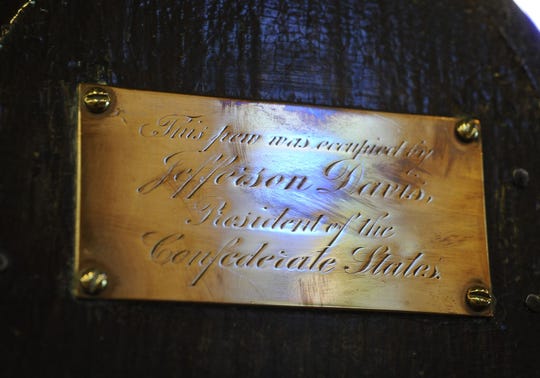 A plaque marking the pew that was occupied by President of the Confederacy Jefferson Davis and his family in St. John's Episcopal Church in downtown Montgomery, Ala.