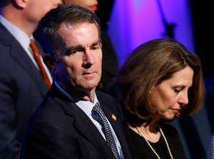 Virginia Gov. Ralph Northam, left, and his wife Pam, attend the funeral of Virginia State Trooper Lucas B. Dowell at the Chilhowie Christian Church in Chilhowie, Va., Feb. 9, 2019.