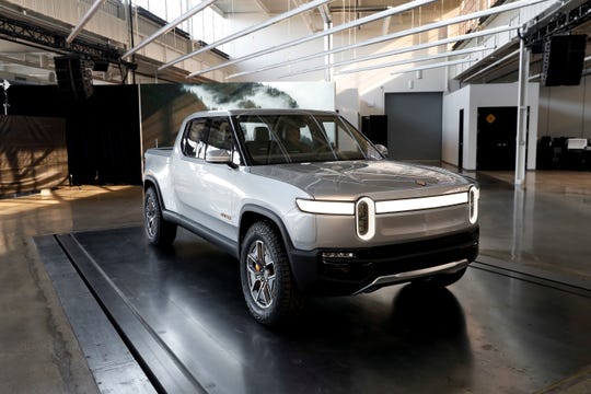 The fully electric Rivian R1T pickup. GM and Amazon are reportedly in talks to invest in the Plymouth, Mich.-based company.