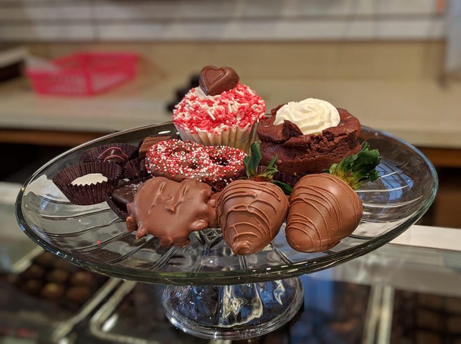 Chocolate-covered strawberries, cupcakes, turtles and assorted chocolates are a welcomed sight for those looking for sweet treat.
