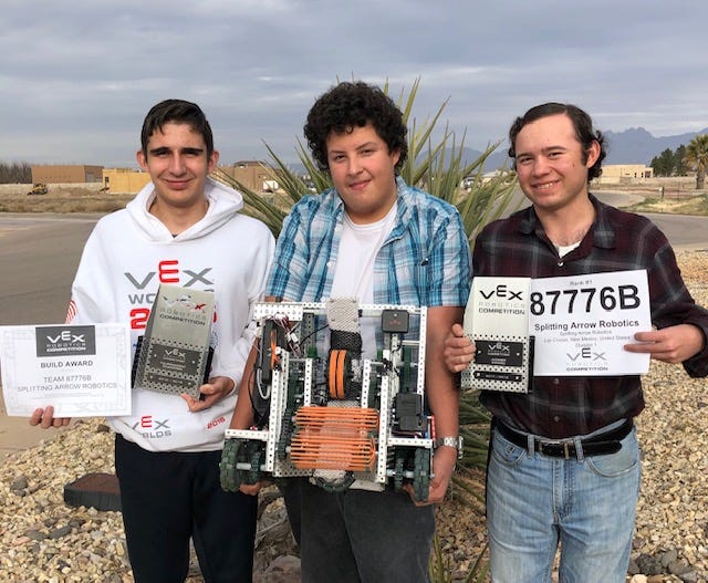 Shiloh Payne, left, Brenton Candelaria and John Bell, display awards they won at a VEX Robotics contest in Albuquerque in late January 2019. The Arrowhead Park Early College High School students now go on to compete Feb. 15-16, 2019 in the statewide contest held at New Mexico State University.