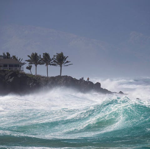 Rough surf hits Oahu's Waimea Bay near Haleiwa,...
