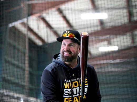Feb. 12: Country music recording artist Garth Brooks works out in a batting cage.