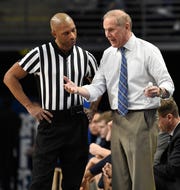 Michigan coach John Beilein pleads his case with referee Lewis Garrison in the first half against Penn State on Tuesday, February 12, 2019, at State College, Pennsylvania.