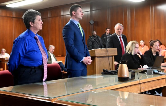Nikki Joly, left, transgender activist, and defense attorney Daniel Barnett, center, face Judge John McBain in circuit court in Jackson on Friday, Feb 1, 2019.  Joly is charged with arson in connection with a fire in his home that killed five pets.
