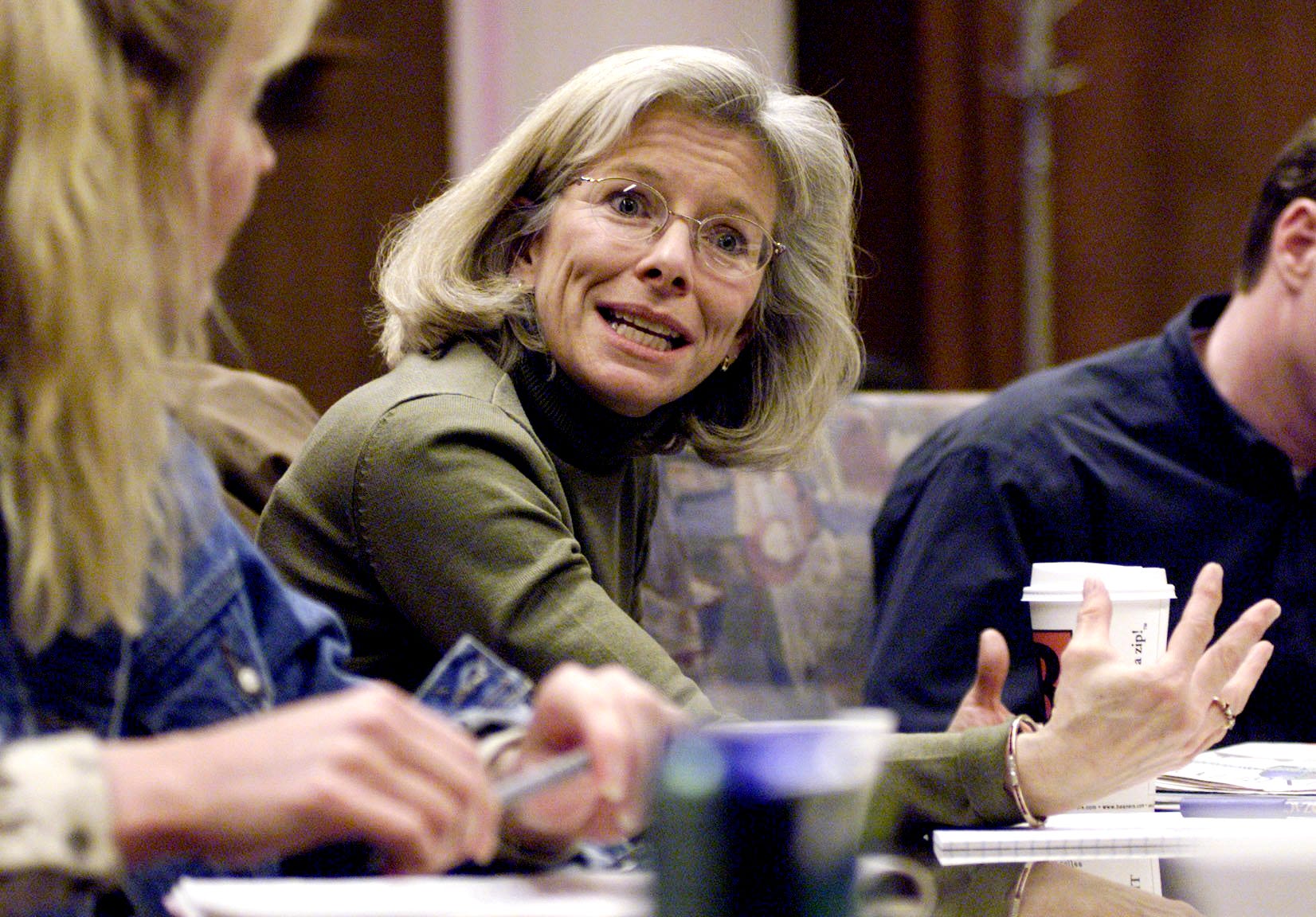 Nan Casey, a family law attorney, participates in a forum discussing the East Lansing riot after the incident.