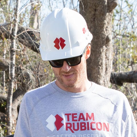 Dale Earnhardt Jr. (right) volunteered with...