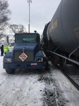 Authorities closed four railroad crossings in Mount Clemens Thursday because of a crash between a train and a propane truck.