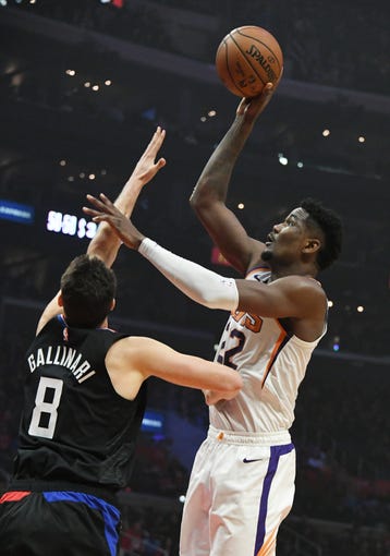 Feb 13, 2019; Los Angeles, CA, USA; Phoenix Suns center Deandre Ayton (22) shoots over LA Clippers forward Danilo Gallinari (8) in the first half at Staples Center. Mandatory Credit: Richard Mackson-USA TODAY Sports