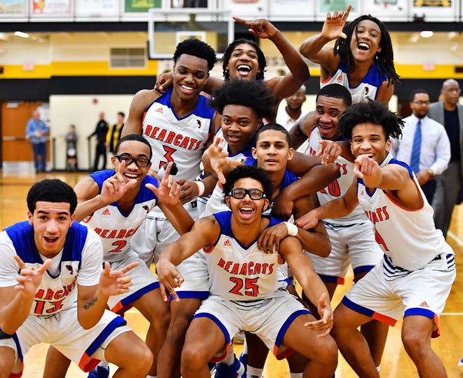 York High celebrates a 74-51 win over Littlestown during York-Adams League boys' basketball semifinal game action at Red Lion Area High School in Red Lion, Wednesday, Feb. 13, 2019. Dawn J. Sagert photo