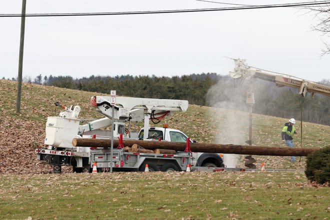 A utility crew struck a gas line on Blue Avenue while replacing a pole Thursday afternoon. 