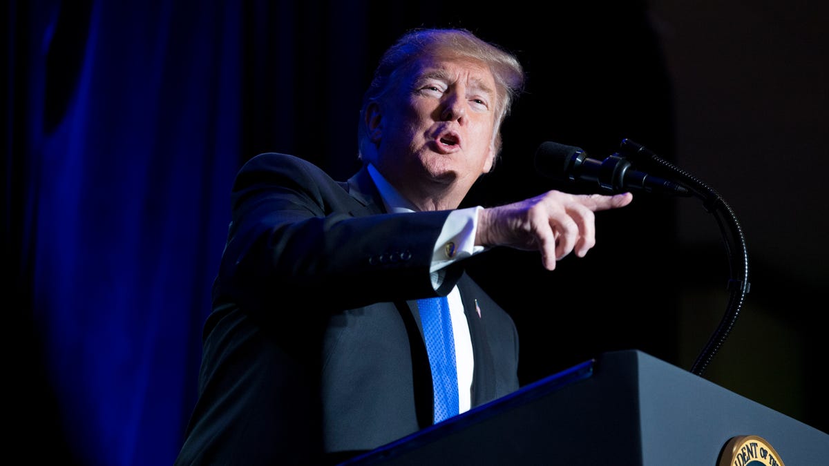 President Donald Trump gestures while delivering remarks at the Major County Sheriffs and Major Cities Chiefs Association Joint Conference, in Washington on Feb. 13, 2019.