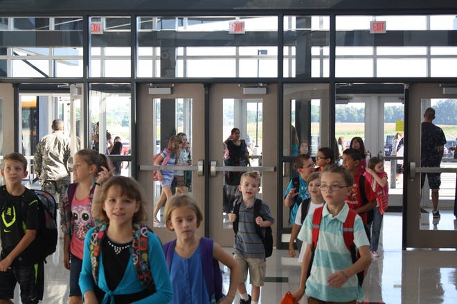 Students stream into the front lobby of Oakland Elementary School, one of the newer schools in the Clarksville-Montgomery County School System.