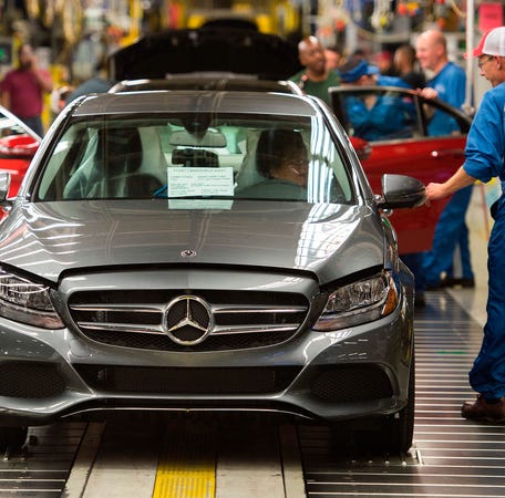 In this file photo taken on June 8, 2017 Employees inspect Mercedes-Benz C-Class cars at the Mercedes-Benz US International factory in Vance, Alabama. - A US Commerce Department report has concluded that American auto imports threaten national security, setting the stage for possible tariffs by the White House, two people familiar with the matter said February 14, 2019. The investigation, ordered by President Donald Trump in May, is "positive" with respect to the central question   of whether the imports "impair" US national security, said a European auto industry source.