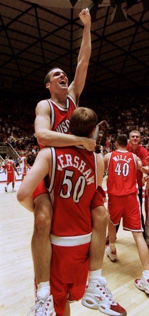 Wisconsin forward Mark Vershaw (50) carries teammate Mike Kelley following Wisconsin's 66-59 upset win over Arizona in the second round of the NCAA West Regional in Salt Lake City on Saturday, March 18, 2000.