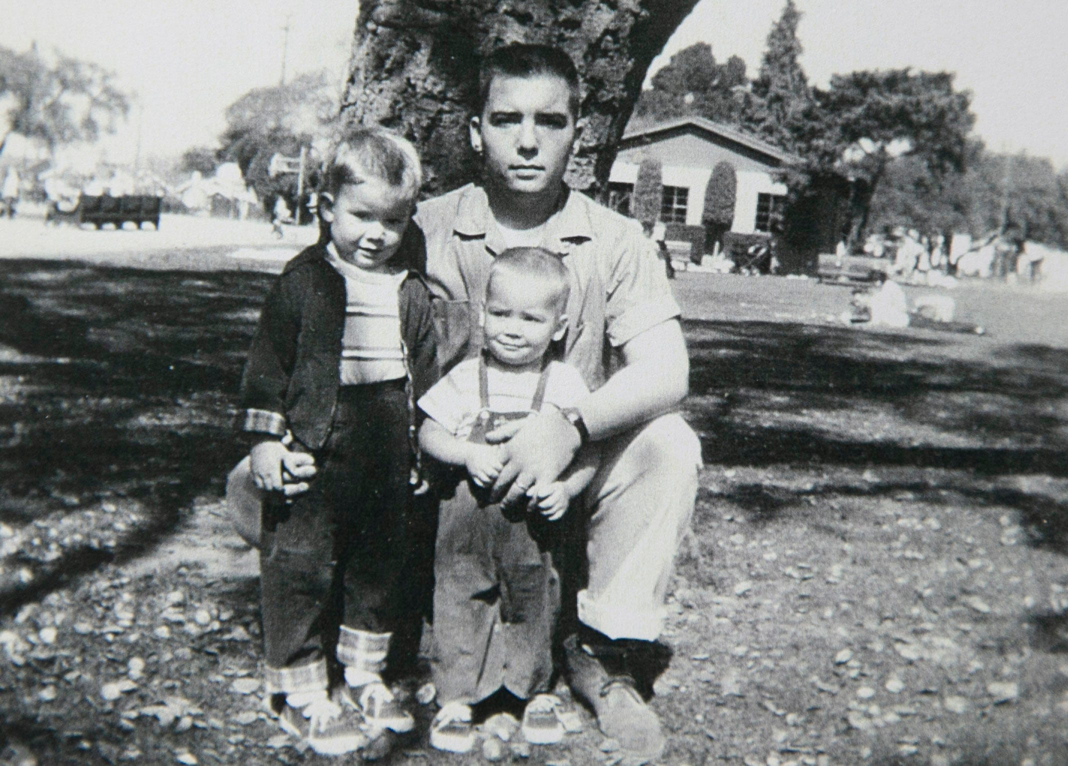 Michael Crow (left) with his father, George, and brother, David, in Memphis, Tennessee, in 1958.