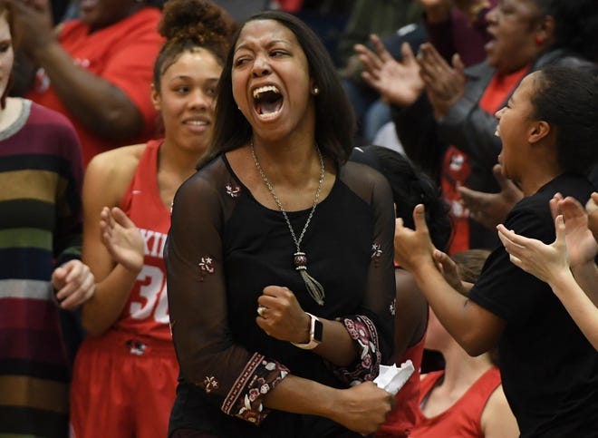 Bianca Hensley celebrates a Region 14-AA tournament semifinal win over her alma mater, Chester County, during a recent game. Hensley has been hired as Stewarts Creek's girls basketball coach.