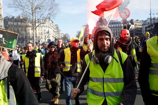 Oy Vey: Tear gas, preference speech mark 14th yellow vest protest 398406b8-3bcf-4c69-b092-49a9524c866b-AP_France_Protests