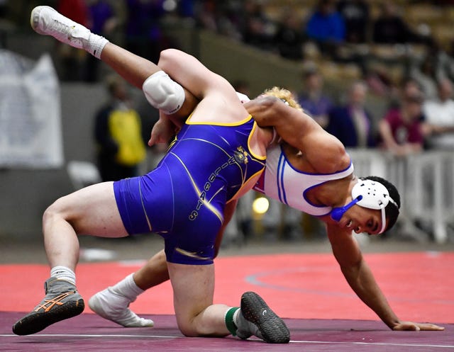 Bradley Williams of Clarksville drives Isaiah Perez of Cleveland to the mat during the TSSAA 2019 Wrestling State Championships at the Williamson County Ag Expo Park Saturday, Feb. 16, 2019 in Franklin, Tenn.