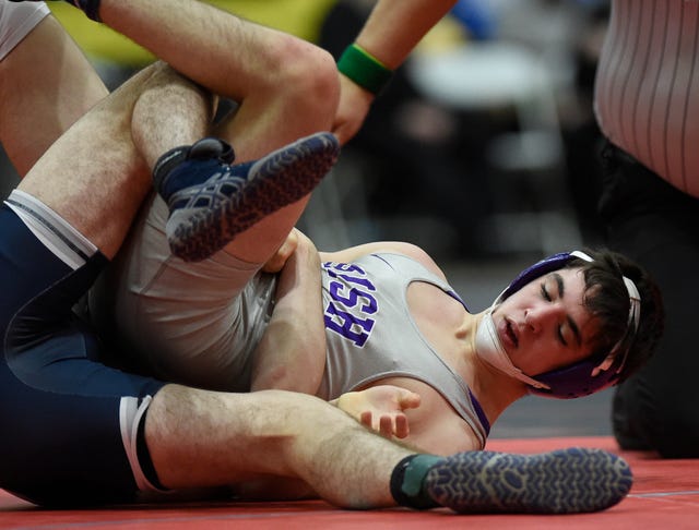 Lawrence Madson of Father Ryan tries to escape James Whitworth of McCallie during the TSSAA 2019 Wrestling State Championships at the Williamson County Ag Expo Park Saturday, Feb. 16, 2019 in Franklin, Tenn.