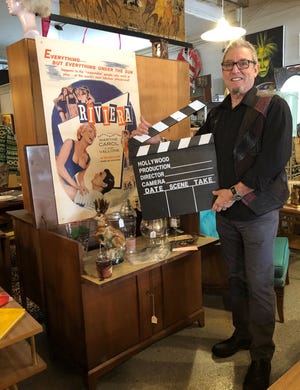 Steve Humphreys stands in his store Vogue Vintage on Hilton in Ferndale. He'll be watching the Oscars with interest on Sunday since he supplied some of the set decor.