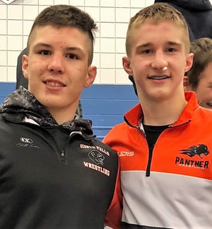 Clayton Whiting, left, and Tyler Budz of Oconto Falls High School qualified for the WIAA State Wrestling Tournament in Madison on Feb. 21-23.