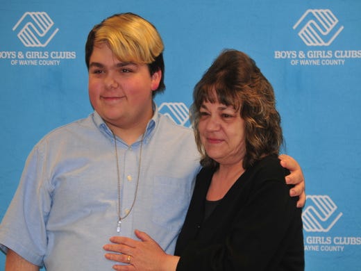 Mikey Martin poses with his mother, Kay Martin, after he was named Youth of the Year for the Boys and Girls Clubs of Wayne County.